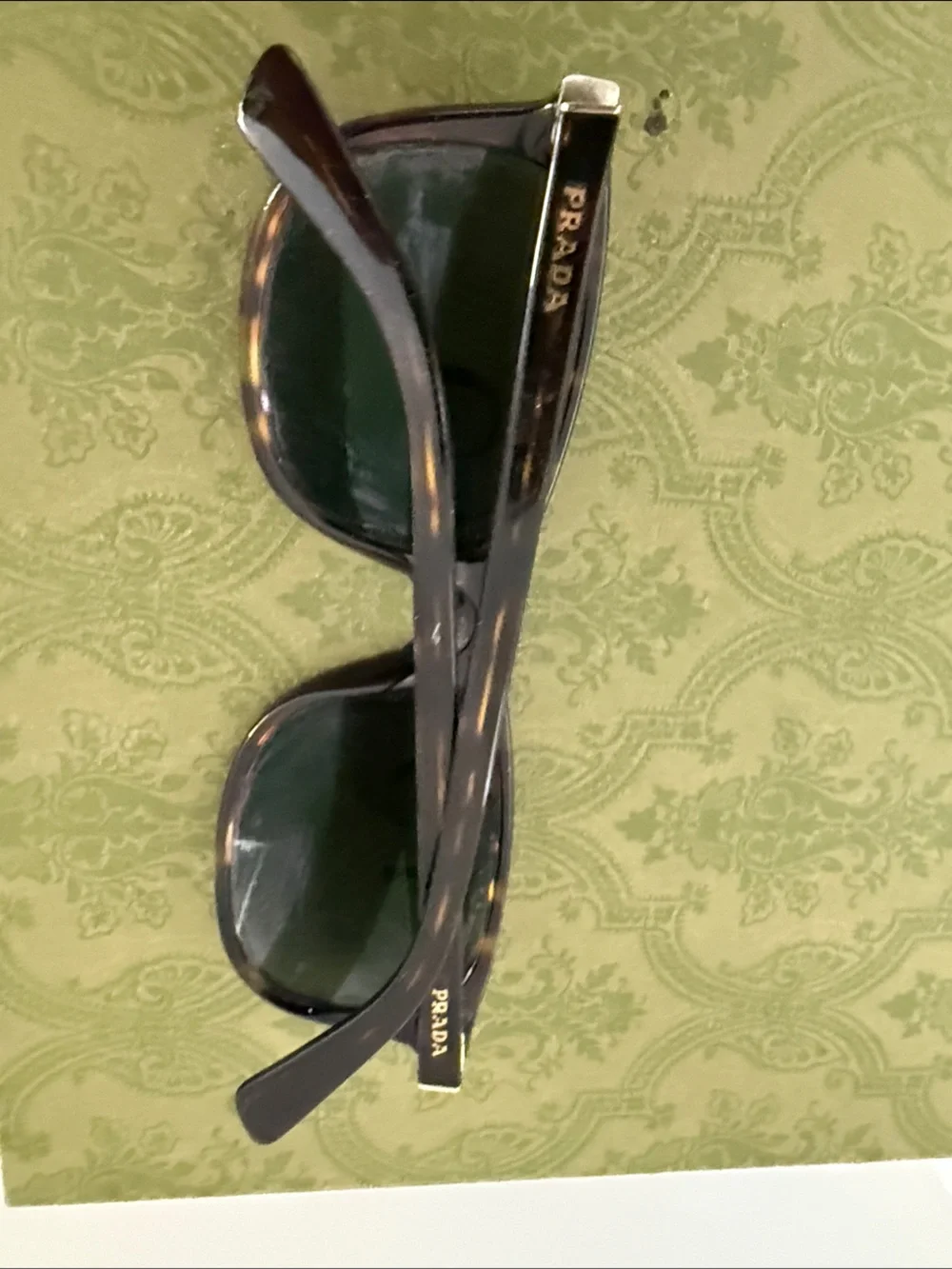 Prada Tortoiseshell Frame Sunglasses with Dark Green Lenses